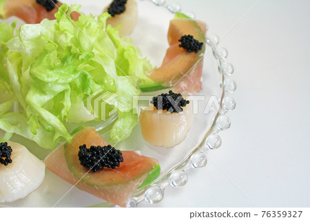 Caviar, scallops and prosciutto hors d'oeuvre Caviar, scallops and prosciutto hors d'oeuvre 76359327