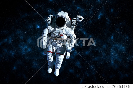 Astronaut spaceman do spacewalk while working for space station 76363126