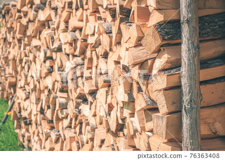 Firewood or fuelwood construction background. Forest timber energy 76363408