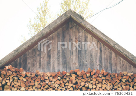 Firewood or fuelwood construction background. Forest timber energy 76363421