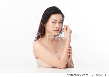 Beautiful young asian woman with clean fresh skin on white background, Face care, Facial treatment, 76365791