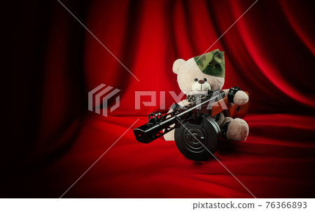 creative teddy bear in a military cap with a PPSH-41 machine gun symbol of the victory of the Red Army in World War II in bdsm belts 76366893