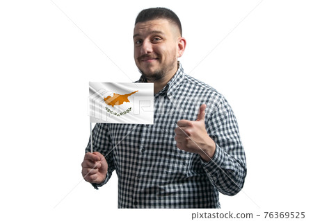 White guy holding a flag of Cyprus and shows the class by hand isolated on a white background. Like for Cyprus White guy holding a flag of Cyprus and shows the class by hand isolated on a white background. Like for Cyprus 76369525