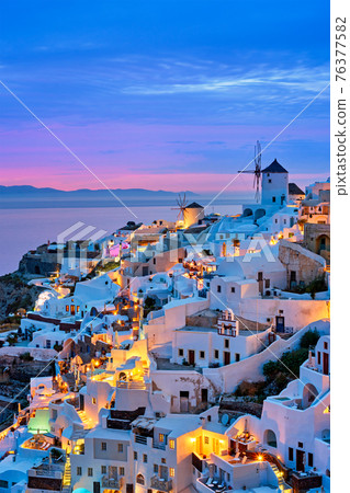 Famous greek tourist destination Oia, Greece 76377582