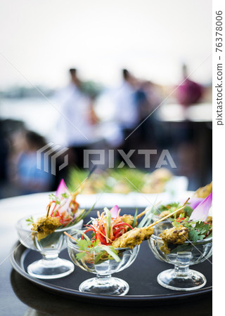 asian chicken satay gourmet snack food in modern outdoor bar asian chicken satay gourmet snack food in modern outdoor bar 76378006