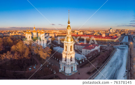 Aerial top view to St. Nicholas Naval Sea Cathedral in sunny day. Panorama of evening historical city center. Orthodox church located on banks of Kryukov and Griboyedov canal. Saint Petersburg. Russia 76378145