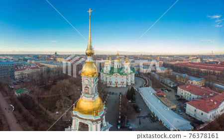 Aerial top view to St. Nicholas Naval Sea Cathedral in sunny day. Panorama of evening historical city center. Orthodox church located on banks of Kryukov and Griboyedov canal. Saint Petersburg. Russia 76378161