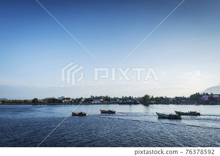 view of traditional fishing boats on kampot river in cambodia 76378592