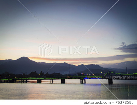 view of old bridge in kampot town cambodia at sunset view of old bridge in kampot town cambodia at sunset 76378593
