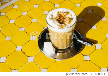 Arabian coffee with spices in Marrakesh medina. Cardamom Ramadan coffee in the oriental market 76380411