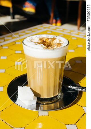 Arabian coffee with spices in Marrakesh medina. Cardamom Ramadan coffee in the oriental market 76380453