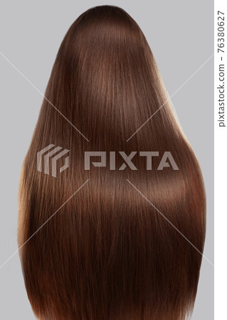 Hair.Woman with luxurious long hair. Healthy brown smooth shiny straight Hair. Keratin straightening.Treatment,care. Smooth Hairstyle. Hair.Woman with luxurious long hair. Healthy brown smooth shiny straight Hair. Keratin straightening.Treatment,care. Smooth Hairstyle. 76380627
