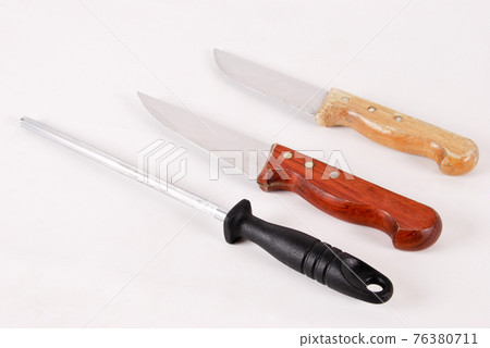 Two knives and sharpening tool, isolated on white background 76380711