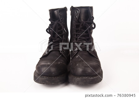 Hiking shoes and a white background, Sturdy hiking boots Hiking shoes and a white background, Sturdy hiking boots 76380945