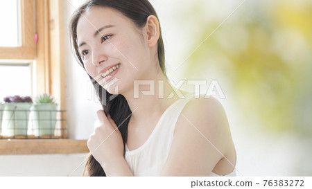 Smiley young woman beauty beauty Smiley young woman beauty beauty 76383272