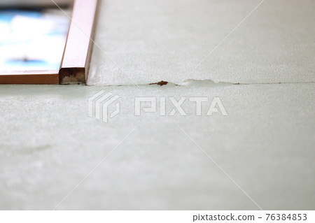 Inner wall of a house, crack in cloth, earthquake, disaster Inner wall of a house, crack in cloth, earthquake, disaster 76384853