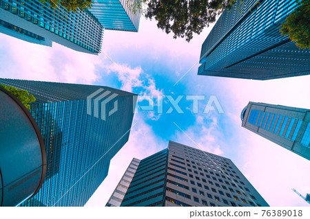 Tokyo cityscape of Japan: Overlooking the offices of Otemachi and the blue sky from the clouds (Otemachi Place on the left) 76389018