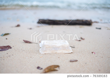 Foam box garbage on the beach. Ecology,  Environmental, pollution and Ecological problem concept 76389163