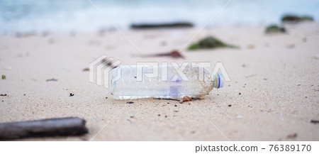 plastic Bottle garbage on the beach. Ecology,  Environmental, pollution and Ecological problem concept 76389170