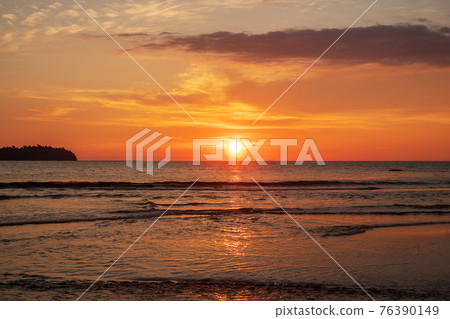 Beautiful sunset over ocean. Seascape and cloudscape concept 76390149