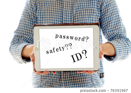A woman showing a tablet screen with letters calling for safety A woman showing a tablet screen with letters calling for safety 76391987