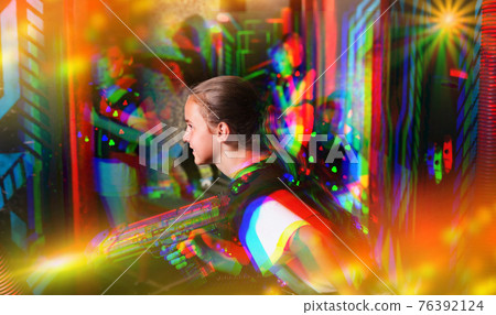 Girl playing laser tag 76392124