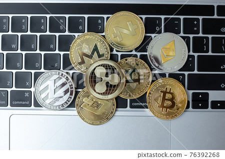 golden and silver Cryptocurrency on keyboard laptop, Bitcoin , Ethereum, Litecoin, Dash, Monero, Zcach and Ripple coins. Crypto is Digital Money within the blockchain network golden and silver Cryptocurrency on keyboard laptop, Bitcoin , Ethereum, Litecoin, Dash, Monero, Zcach and Ripple coins. Crypto is Digital Money within the blockchain network 76392268