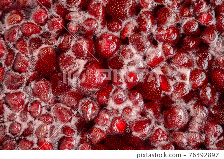 Strawberry jam is boiling, detailed shooting. Strawberry jam is boiling, detailed shooting. 76392897
