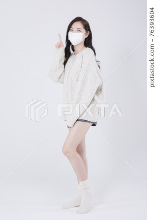 Asian female model with long hair with mask and winter fashion Asian female model with long hair with mask and winter fashion 76393604
