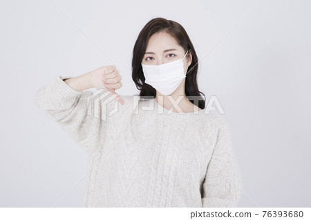 Asian female model with long hair with mask and winter fashion Asian female model with long hair with mask and winter fashion 76393680