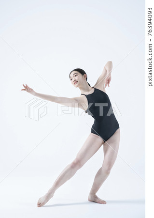contemporary Asian female dancer making move in white background contemporary Asian female dancer making move in white background 76394093