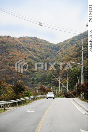 handsome Asian male model autumn travel concept handsome Asian male model autumn travel concept 76394121