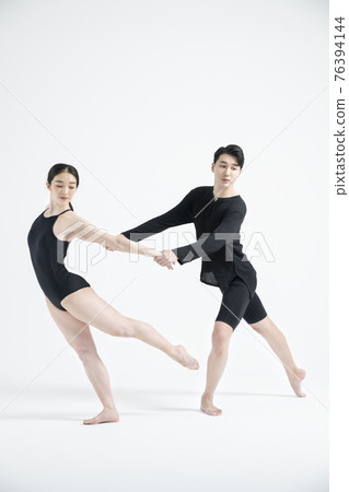 male and female couple modern contemporary dancers making moves in white background setting 76394144