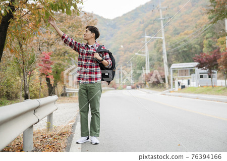 handsome Asian male model autumn travel concept handsome Asian male model autumn travel concept 76394166