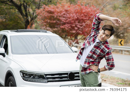handsome Asian male model autumn travel concept 76394175