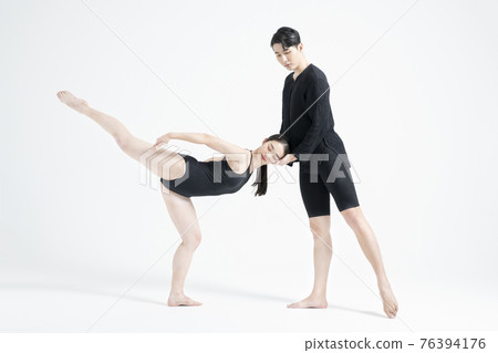 male and female couple modern contemporary dancers making moves in white background setting male and female couple modern contemporary dancers making moves in white background setting 76394176