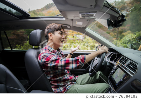 handsome Asian male model autumn travel concept 76394192