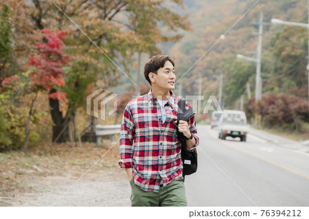 handsome Asian male model autumn travel concept handsome Asian male model autumn travel concept 76394212