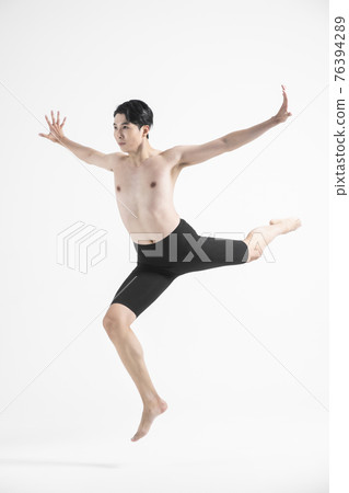 contemporary asian male dancer making move in white background contemporary asian male dancer making move in white background 76394289