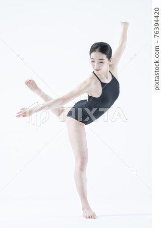 contemporary Asian female dancer making move in white background contemporary Asian female dancer making move in white background 76394420