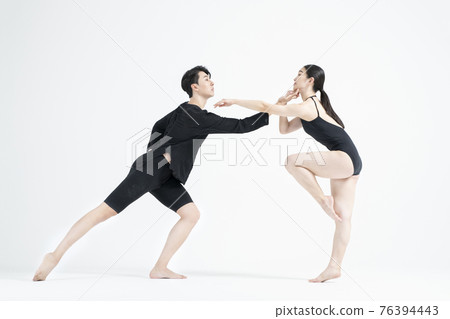 male and female couple modern contemporary dancers making moves in white background setting 76394443