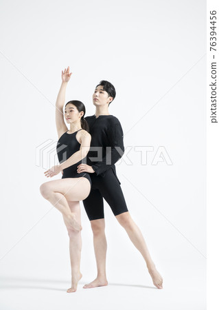 male and female couple modern contemporary dancers making moves in white background setting male and female couple modern contemporary dancers making moves in white background setting 76394456