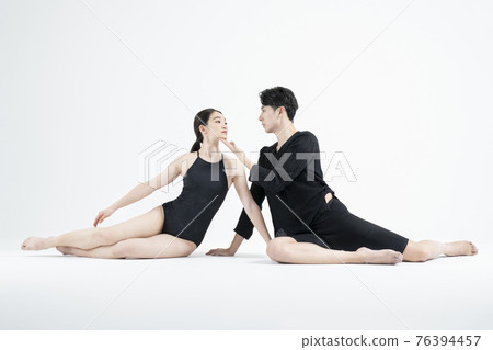 male and female couple modern contemporary dancers making moves in white background setting male and female couple modern contemporary dancers making moves in white background setting 76394457
