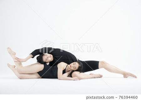 male and female couple modern contemporary dancers making moves in white background setting male and female couple modern contemporary dancers making moves in white background setting 76394460