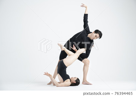 male and female couple modern contemporary dancers making moves in white background setting male and female couple modern contemporary dancers making moves in white background setting 76394465