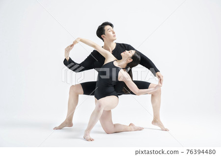 male and female couple modern contemporary dancers making moves in white background setting male and female couple modern contemporary dancers making moves in white background setting 76394480