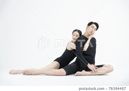 male and female couple modern contemporary dancers making moves in white background setting 76394487