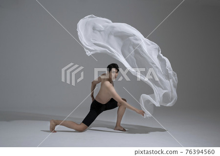 male and female couple modern contemporary dancers making moves in white background setting male and female couple modern contemporary dancers making moves in white background setting 76394560