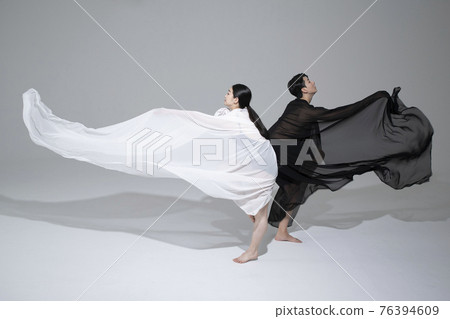 male and female couple modern contemporary dancers making moves in white background setting 76394609