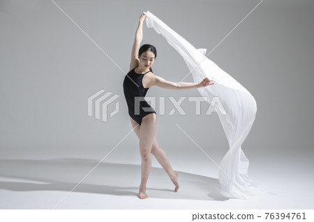 male and female couple modern contemporary dancers making moves in white background setting 76394761